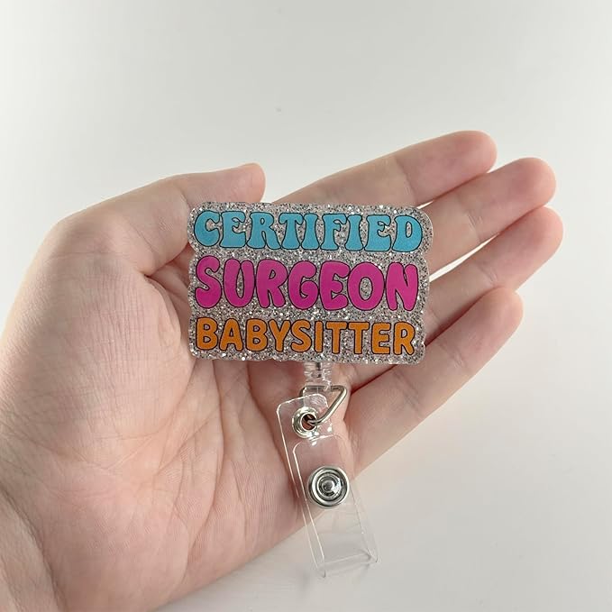 Certified Surgeon Babysitter Funny Badge Reel, Glitter Retractable Medical ID Card Badge Holder, Name Tag Work Clip for Surgeon Doctors | Night Shift Nurse, RN CNA LPN MA Badge Buddy